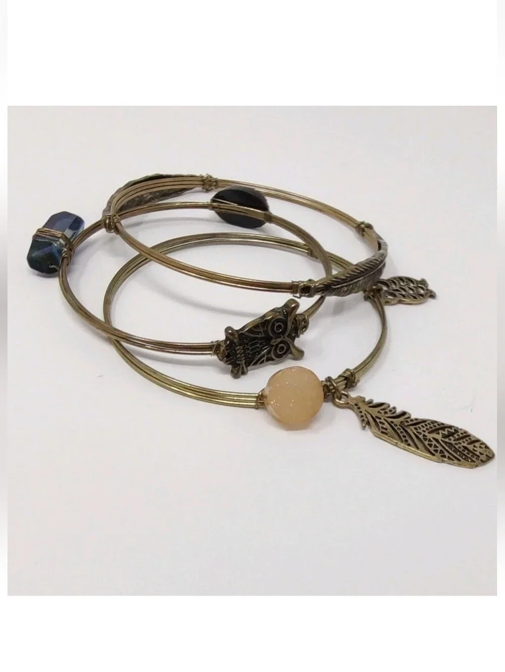 Boho Bangles Set of 3 Gold Bronze Tone Bracelets Wire Wrap Charms Feathers Owls